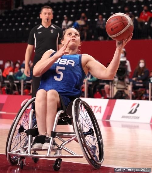 2020 U.S. Paralympian Darlene Hunter goes up for a shot during a wheelchair basketball game