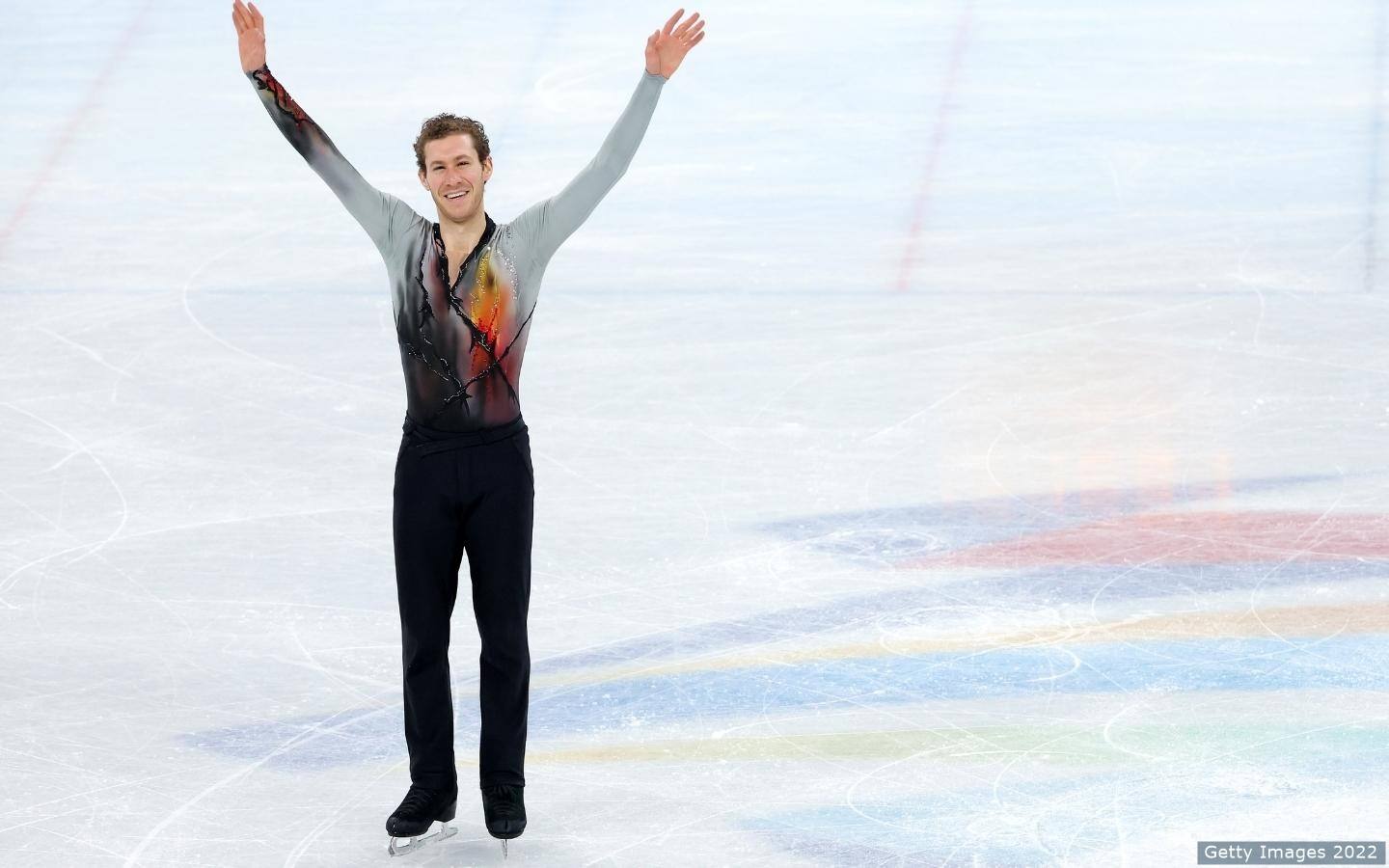 Jason Brown waves to crowd at end of Beijing 2022 performance