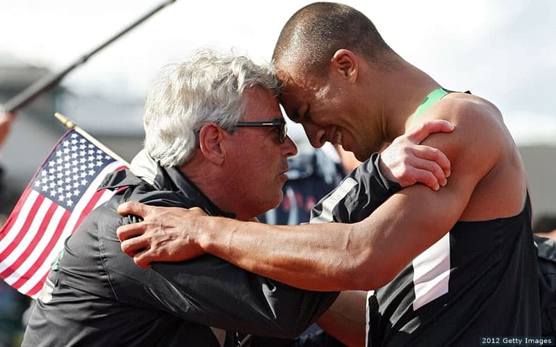 Ashton Eaton hugs his coach Harry Marra (R) after breaking the world record in the men's decathlon after competing in the 1500 meter run portion during Day Two of the 2012 U.S. Olympic Track & Field Team Trials at Hayward Field on June 23, 2012 in Eugene, Oregon.