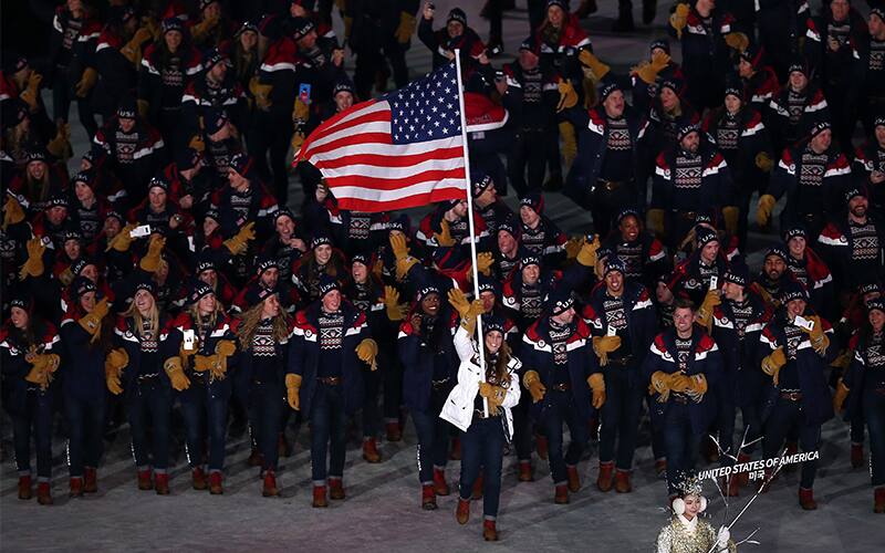 Erin Hamlin leads the U.S. Olympic Team into Opening Ceremony.
