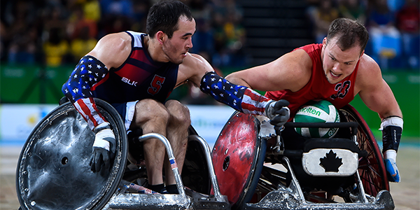 Team USA's Chuck Aoki battles with a Team Canada wheelchair rugby athlete at Rio 2016