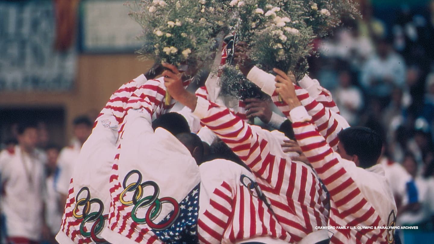 Team USA celebrates their gold medal in Men's Basketball at the Barcelona 1992 Olympic Games. 