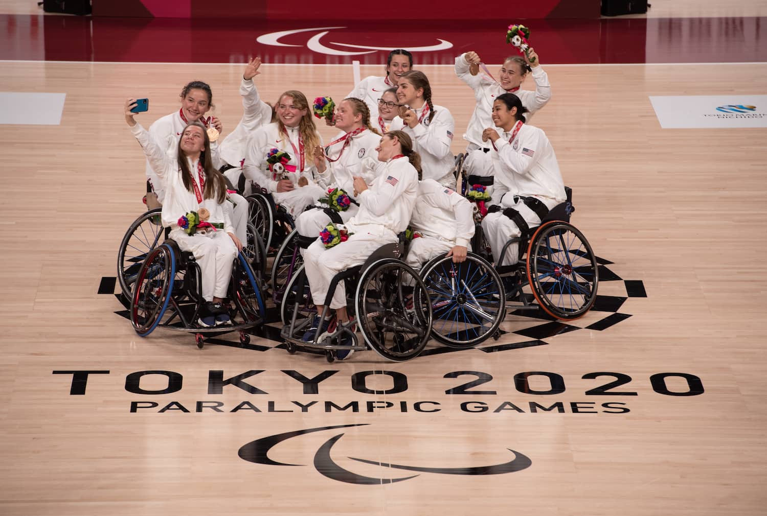 USA women's wheelchair basketball poses for a selfie after winning bronze at the Tokyo Paralympics