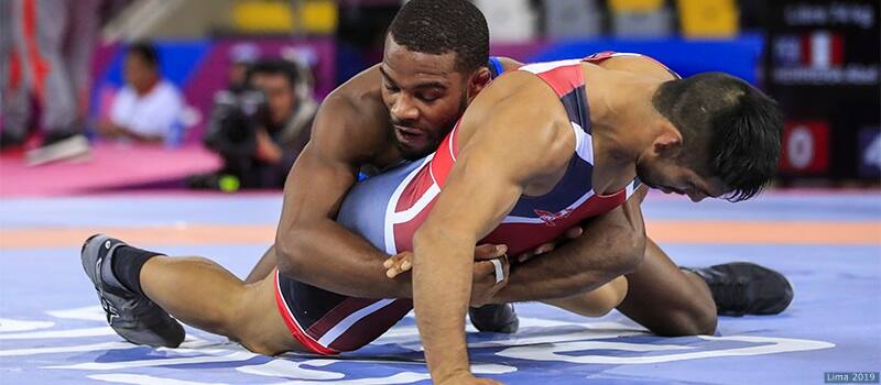 Team USA's Jordan Burroughs competes against Peru's Abel Herrera in the Men's Freestyle 74 kg, division of Wrestling. Burroughs would go on to win the gold medal. 