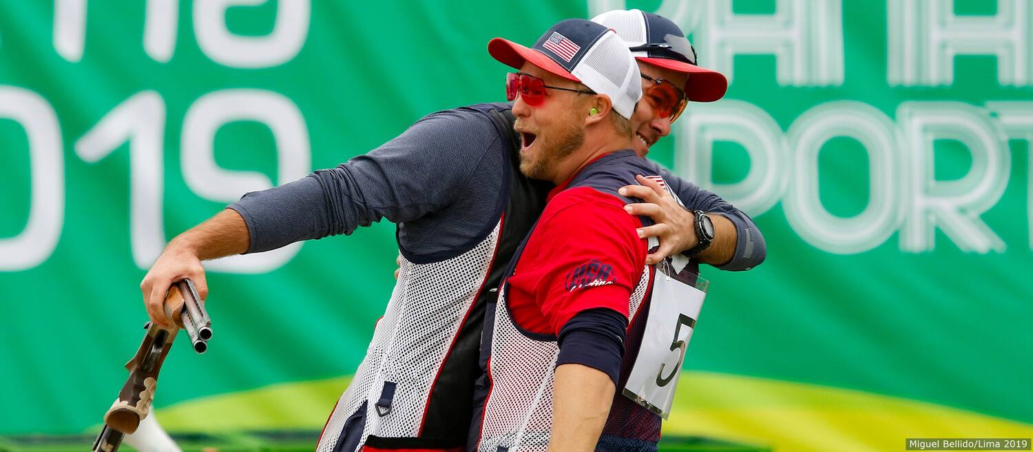 Team USA's Derek Haldeman and Brian Burrows hug in celebration during the Shooting men“s trap competition at the Base Aerea Las Palmas at the Pan American Games Lima 2019.