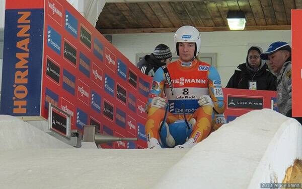 Luge's Jake Hyrns and Andrew Sherk (at back) - the 2010/2011 overall junior World Cup champions - prepare for their first-run start of the doubles race at the 2013 Lake Placid Luge World Cup.