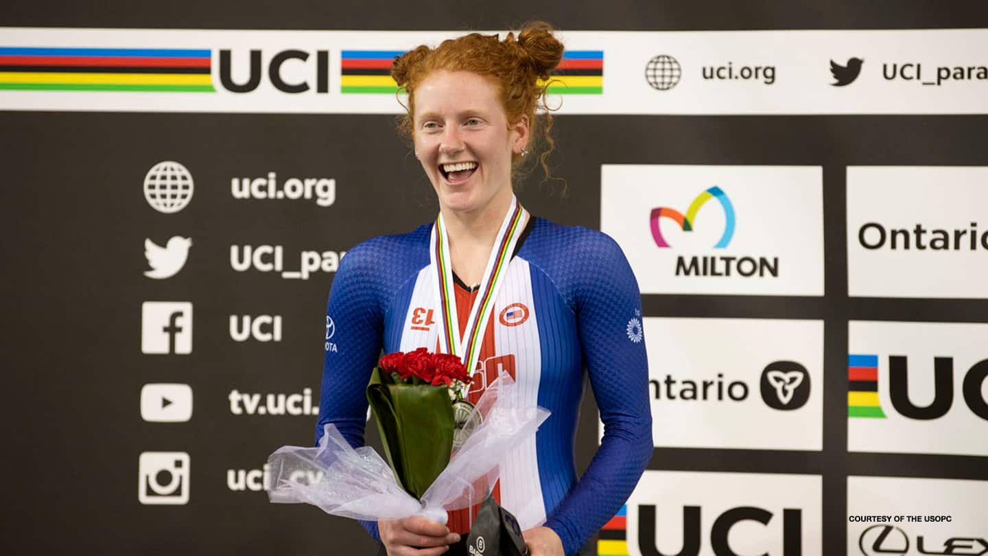 Clara Brown smiles from the podium at the 2020 Cycling Track World Championships