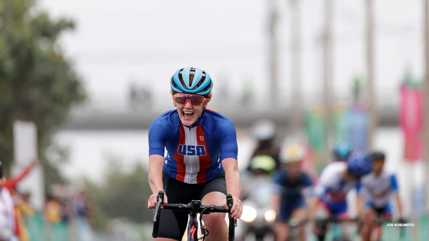 Clara Brown celebrates after finishing a race. 