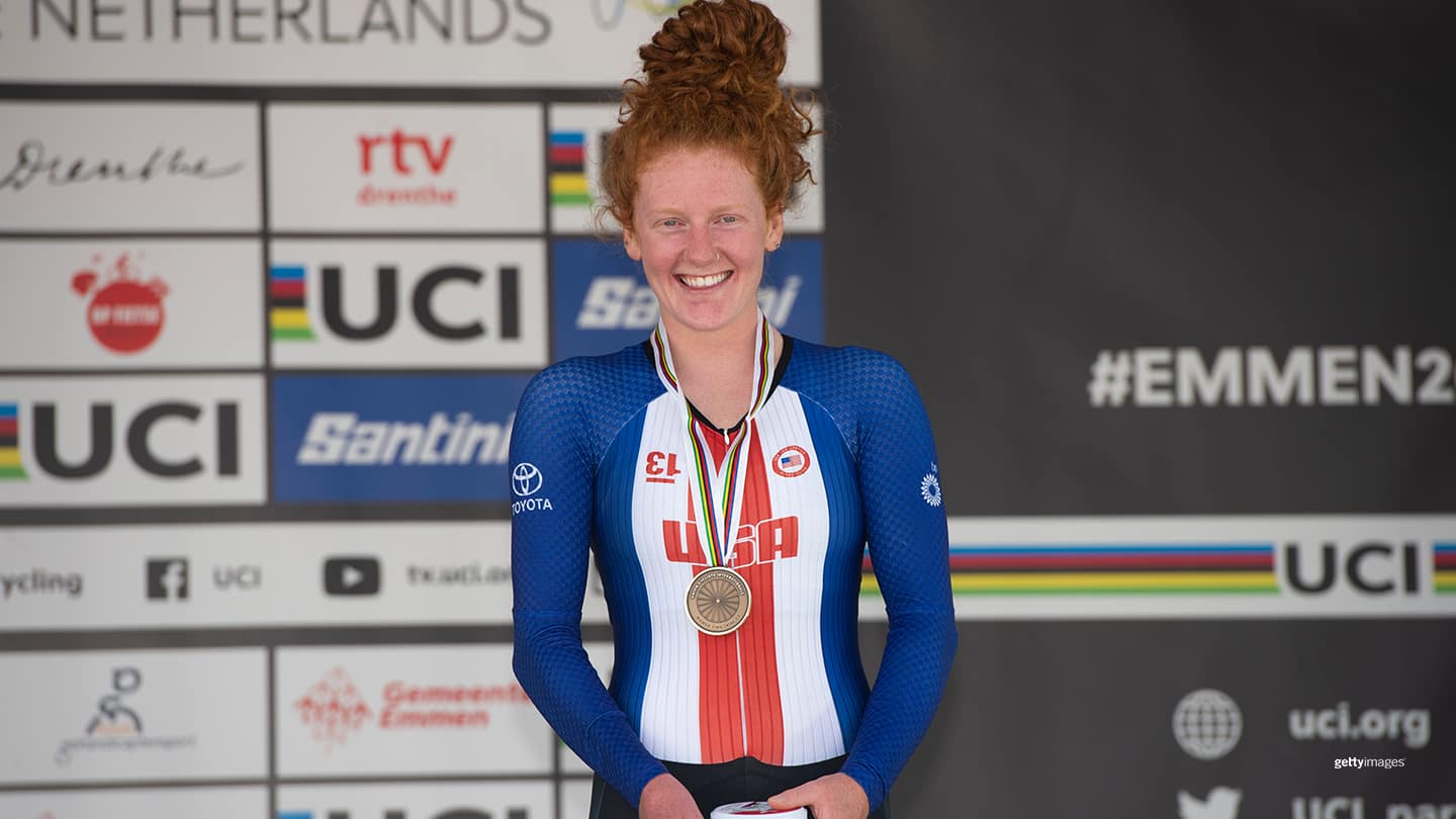 Clara Brown poses on the podium following the Time Trials event at the 2019 UCI Para-cycling Road World Championships.