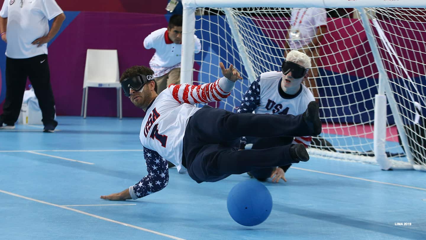 Matt Simpson dives in a Goalball match in Lima, Peru in 2019. 