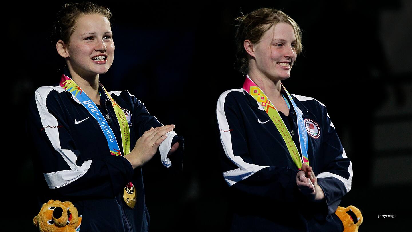 Amanda Everlove (R) and Anna Johannes celebrate a gold medal in Women's 100m Butterfly S9 during the 2011 Parapan American Games on Nov. 13, 2011 in Guadalajara, Mexico.