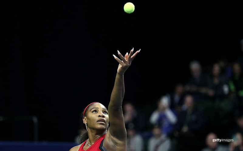 Serena Williams prepares to serve at the 2020 Fed Cup. 