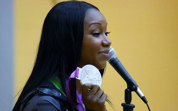 Carmelita Jeter talks to school