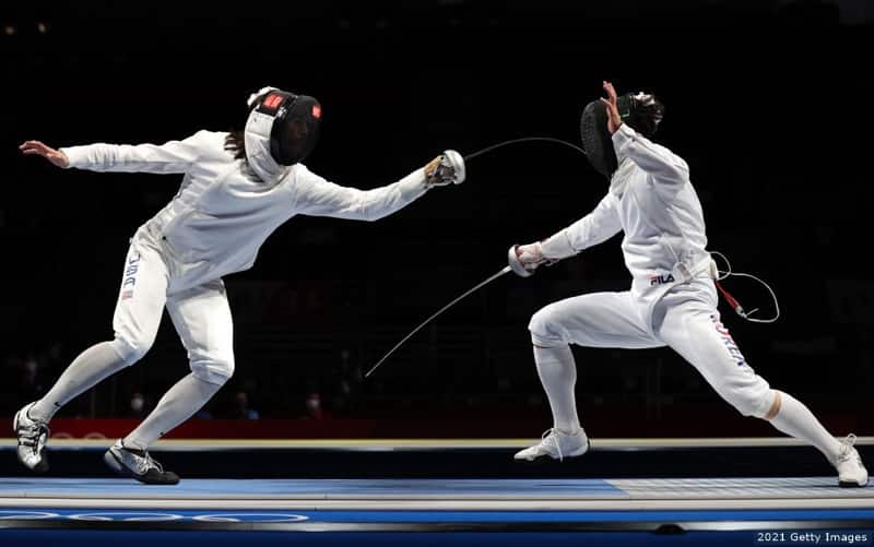 U.S. fencer Jake Hoyle squares off with Sangyoung Park of South Korea at the Tokyo 2020 Olympic Games.
