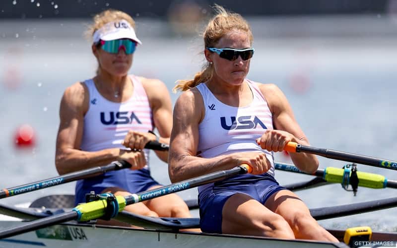 Rowers Gevvie Stone and Kristi Wagner strain during a race.