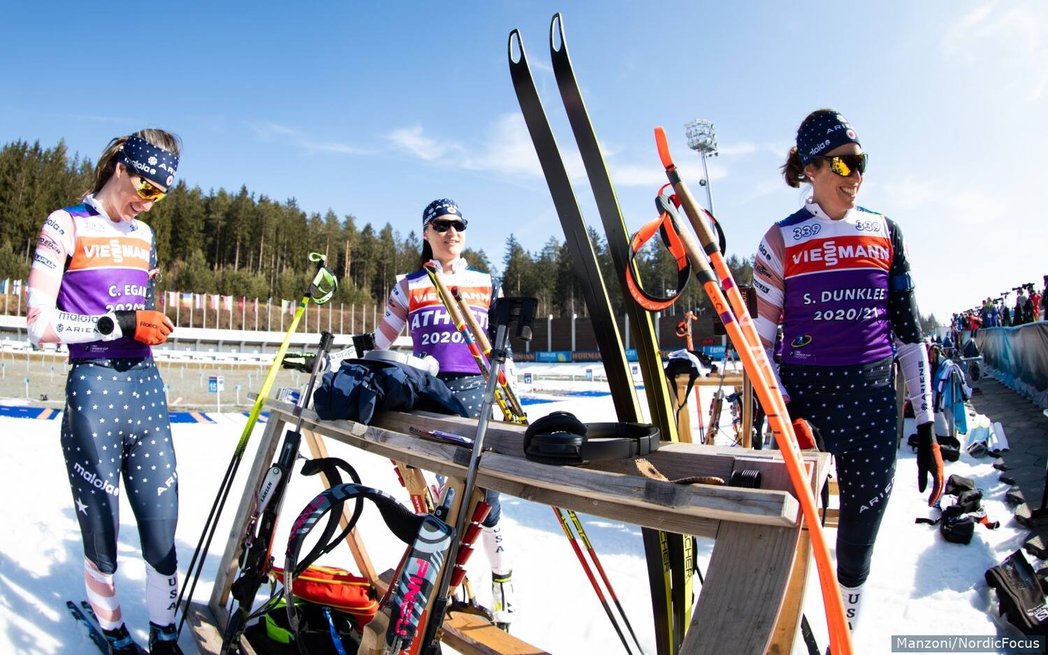Clare Egan, Joanne Reid and Susan Dunklee get ready for a training session in Nove Mesto