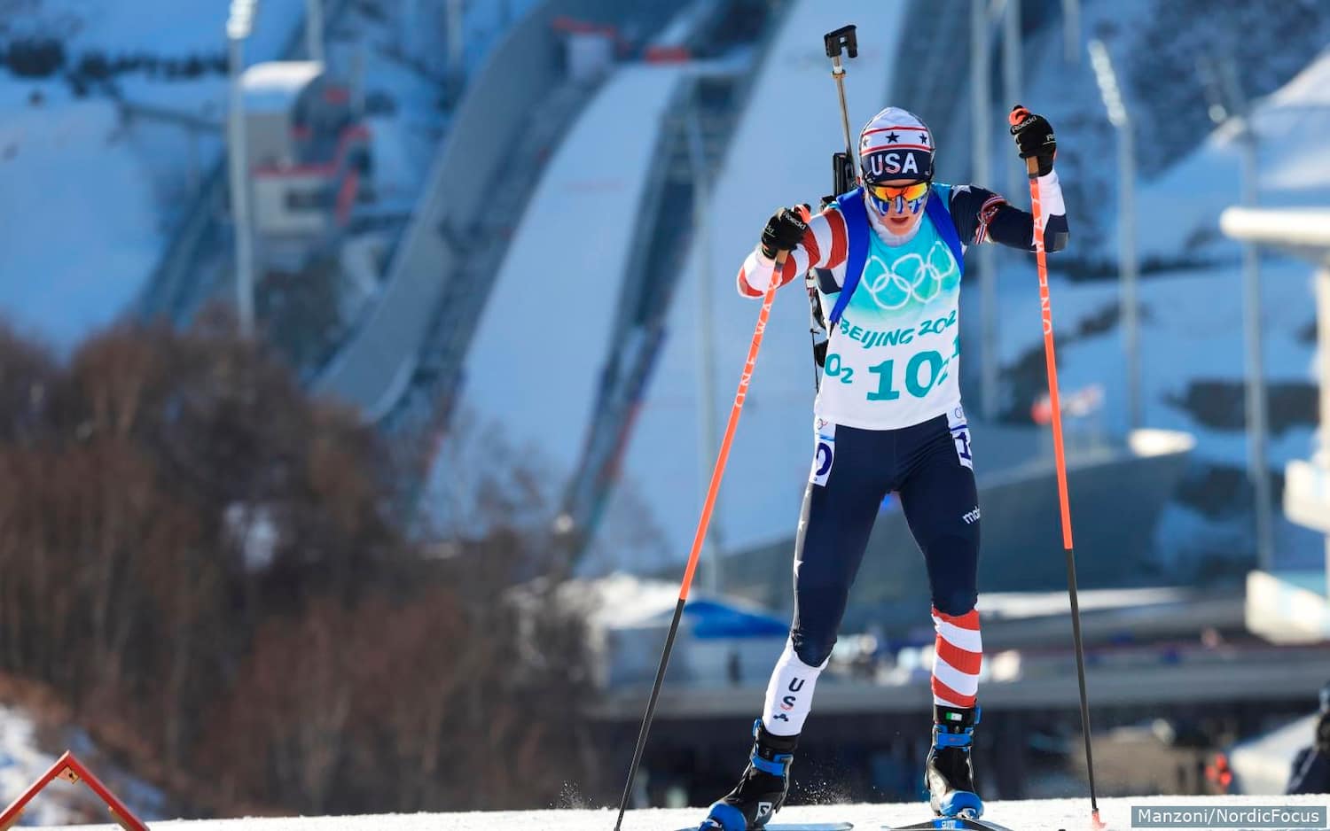 Clare Egan races in the women's relay on Feb. 16, 2022, at the Beijing Winter Games