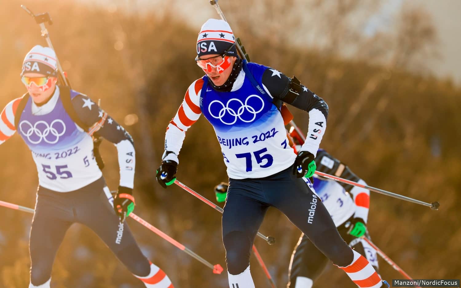 Jake Brown skis next to teammate Sean Doherty during the men's 20k individual on Feb. 8 at the Beijing 2022 Olympic Games (photo by Nordic Focus)