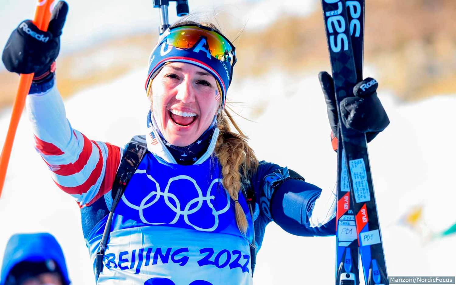 Deedra Irwin reacts after racing in the women's mass start at the Beijing 2022 Olympic Games