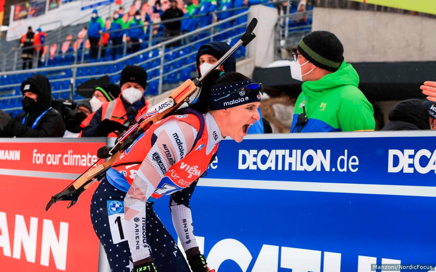 Joanne Reid lets out a scream after crossing the finish line in 5th place