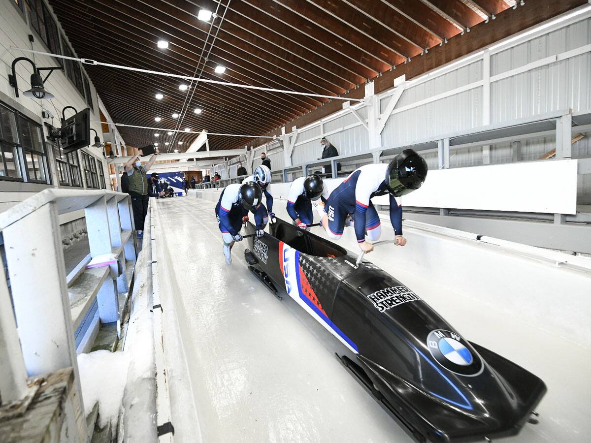 Team Church loading into the sled at the start