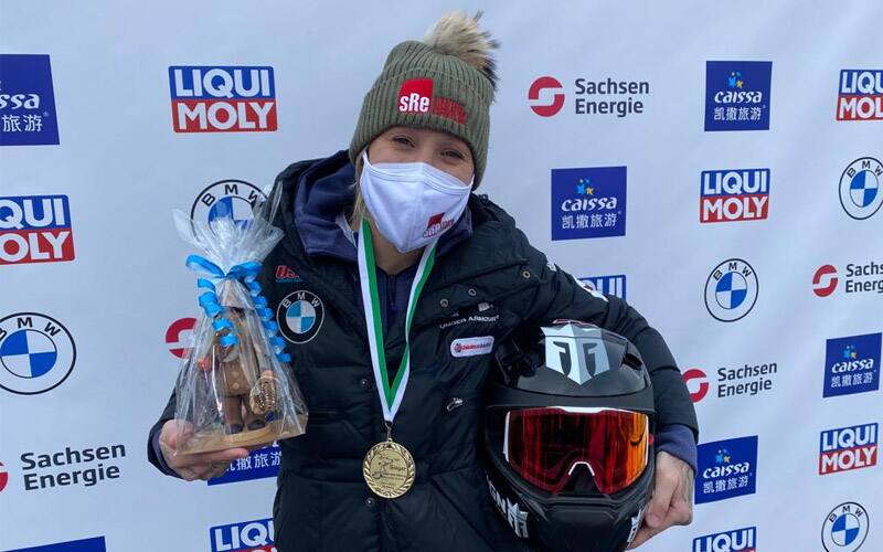 Kaillie celebrates with her trophy 