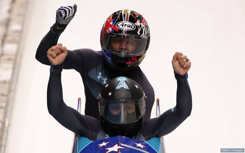 Elana and Sylvia celebrate after crossing the finish line in third