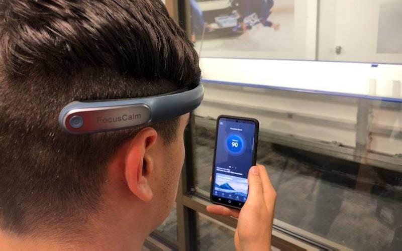 A bobsled athlete uses the FocusCalm app before a training session