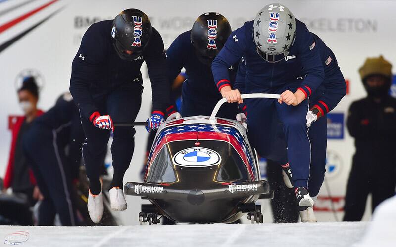 Team Church pushes off at the start during a training run