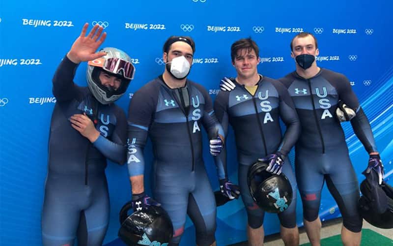 Team Church in the leader's box at the 2022 Olympic Winter Games