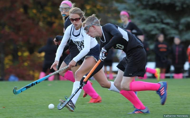 Colin Hennessy dribbles the ball during a high school game in Massachusetts