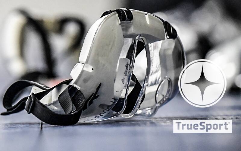 Corner mask on the ground with TrueSport logo