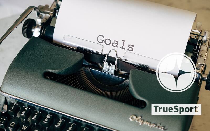 Goals typed on a typewriter with TrueSport logo