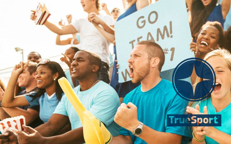 Sport fans cheer for their kids with the TrueSport logo