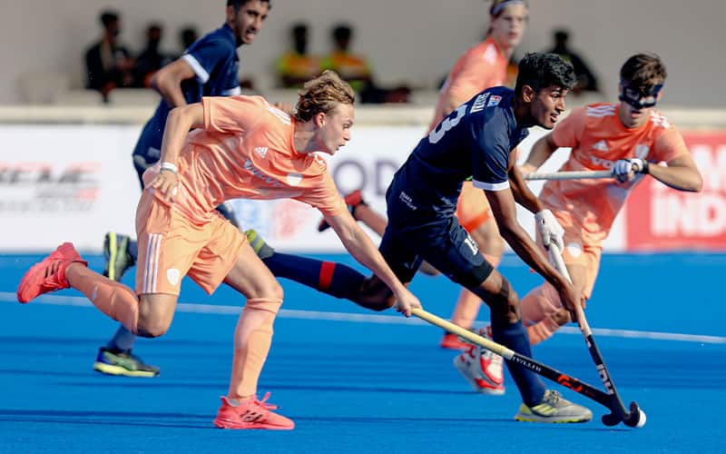 Jatin Sharma dribbles the ball against the Netherlands at the FIH Odisha Hockey Men's Junior World Cup on November 28, 2021