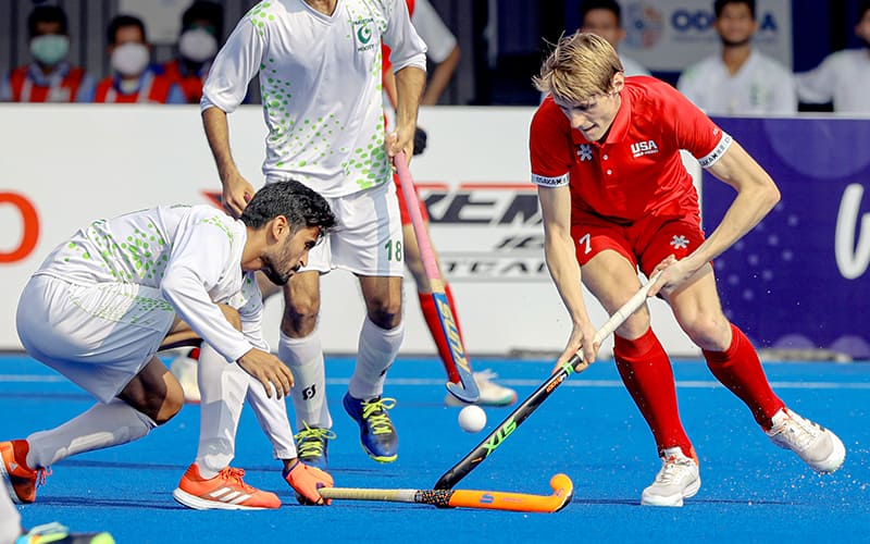 Finlay Quaile dribbles the ball against Pakistan at the FIH Odisha Hockey Men's Junior World Cup on November 30, 2021