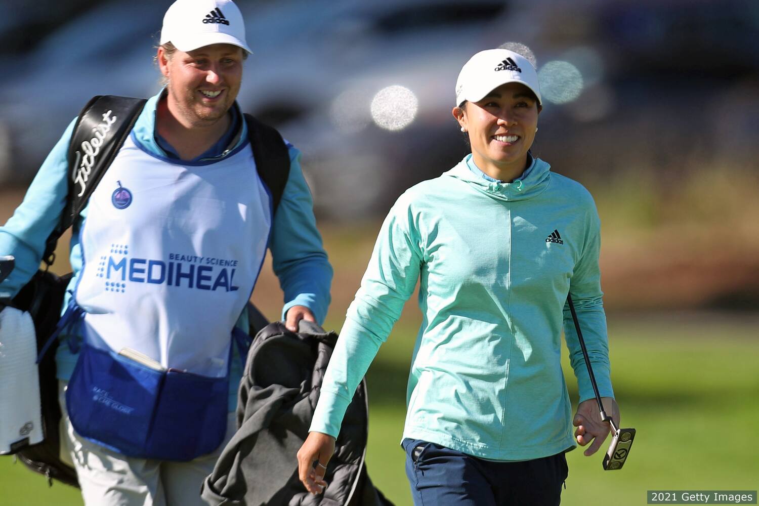 Danielle Kang and caddie at Lake Merced.
