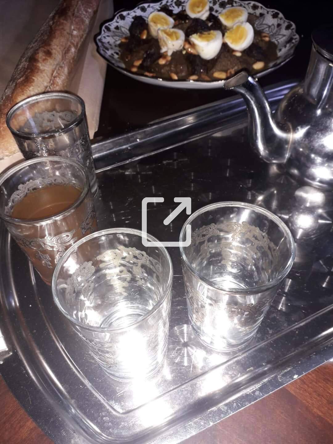 Moroccan Beef Tagine with prunes, almonds, hard boiled eggs, and Moroccan Hot Tea