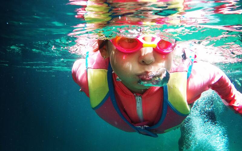 Child Swimming Image