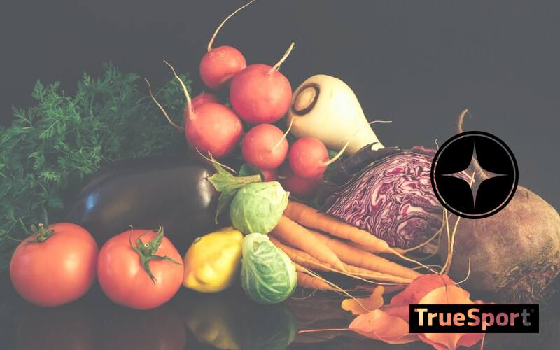 Assorted Vegetables (Carrots, Eggplant, and other root vegetables on table