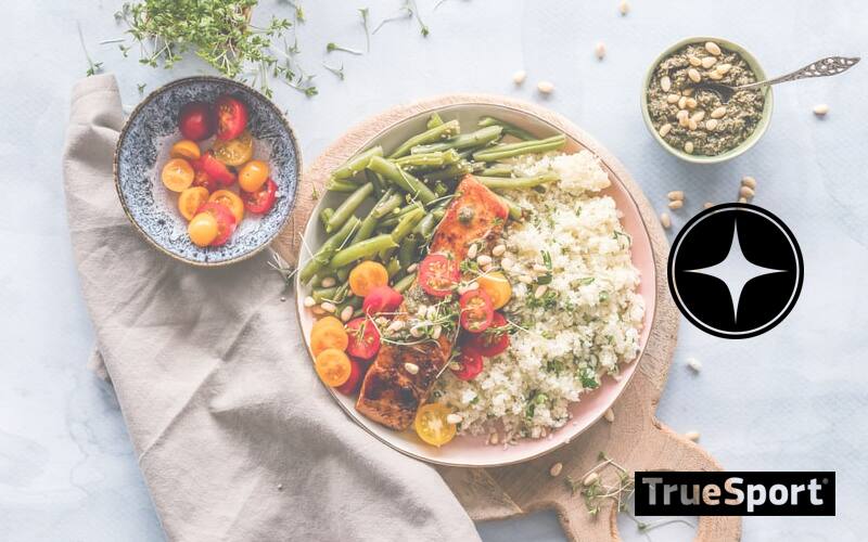 Quinoa Bowl arranged on wooden tray on table