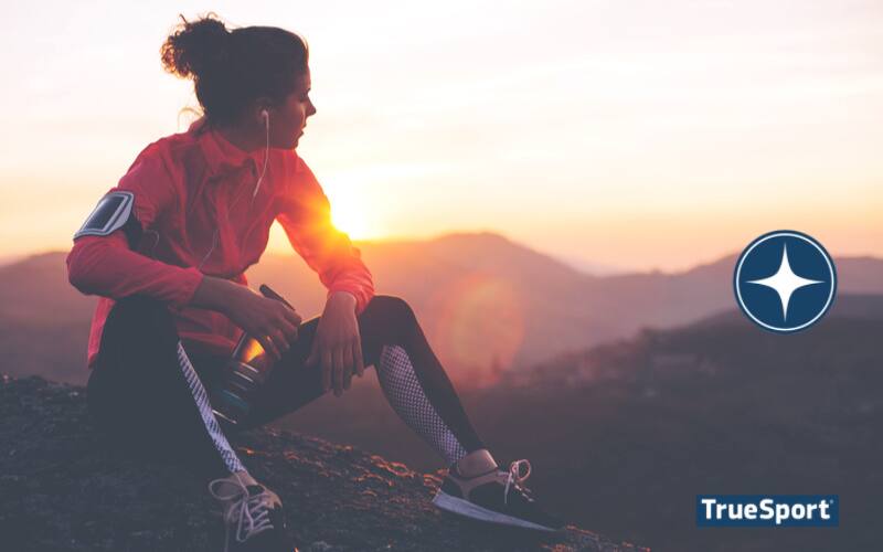 Athlete looking at the view of the mountains