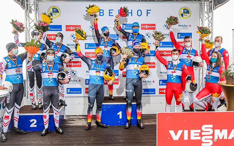 The Oberhof, ermany replay podium featuring teams from Austria, Germany and Poland