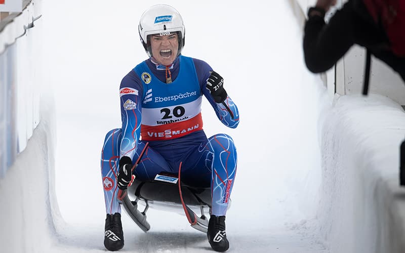 Summer Britcher celebrates in the outrun after winning bronze on Ja.uary 24, 2021 in Austria