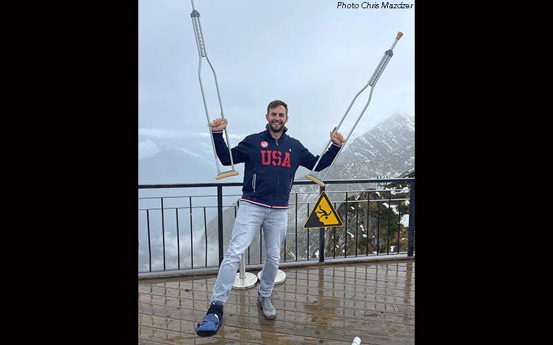 Chris Mazdzer with crutches
