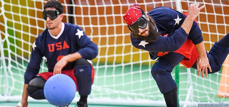 John Kusku throws a ball alongside Tyler Merrin during goalball competition at the Paralympic Games Rio 2016.
