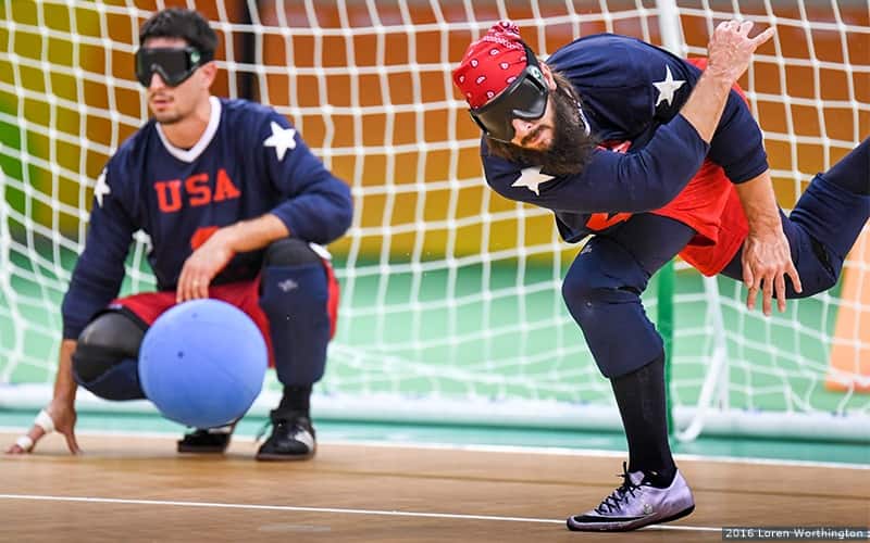 John Kusku throws a ball alongside Tyler Merrin during goalball competition at the Paralympic Games Rio 2016.