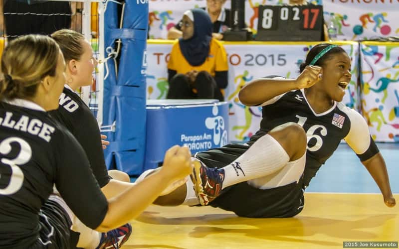 Sitting volleyball player Nicky Nieves pumps her fist in celebration after winning a match during the 2015 Parapan American Games in Toronto.