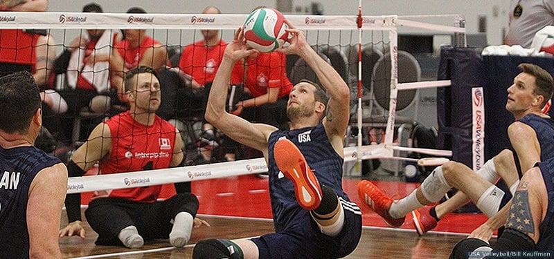 Sitting volleyball player Nicky Nieves pumps her fist in the air after winning a match at the 2015 Parapan American Games in Toronto.