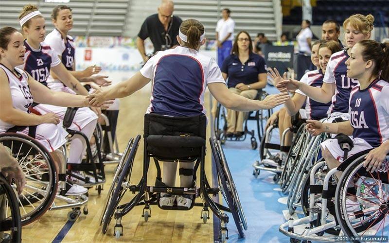 Steve Serio and members of the U.S. men's wheelchair basketball team competing against Canada.